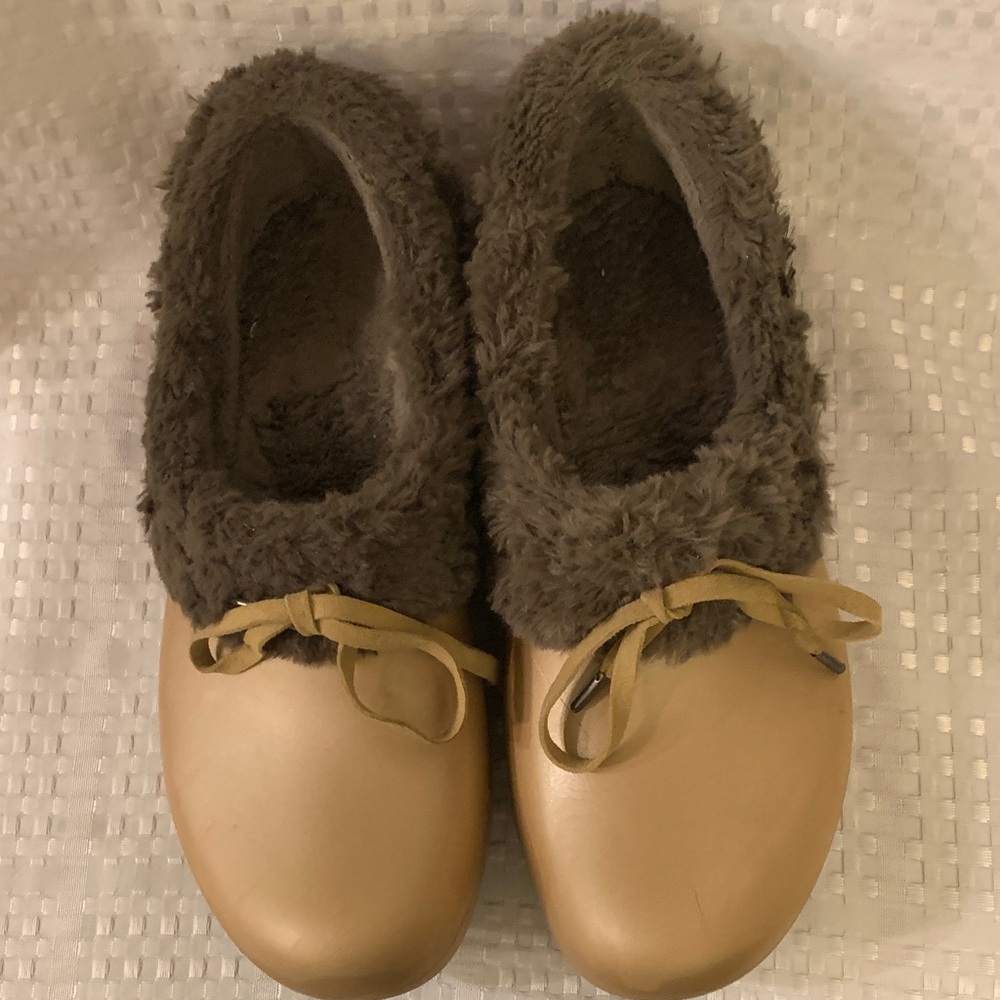 CROCS  gold with brown faux fur lining and trim, women’s size 9.